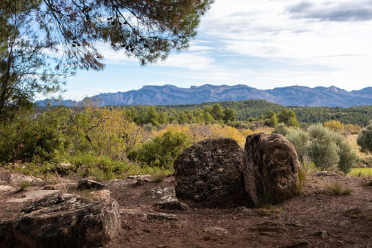 Burial mound made of stones in the countryside, Mas de Toribio near Calaceite, Teruel, Aragon, Spain
