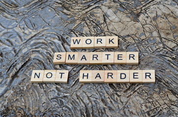 work smarter not harder text on wooden , motivation and business quotes