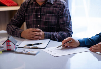 Real estate company to buy houses and land are delivering keys and houses to customers after...