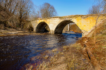 Bridge over the Lava River in the village of Vasilkovo.