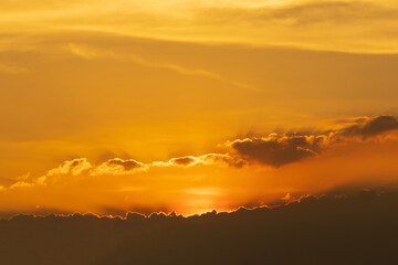 Dramatic clouds and sky like heaven view at sunset time. with gold or golden light tone.