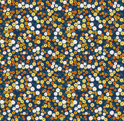 Beautiful floral pattern in small abstract flowers. Small colorful flowers. Blue background. Ditsy print. Floral seamless background. The elegant the template for fashion prints. Stock pattern.