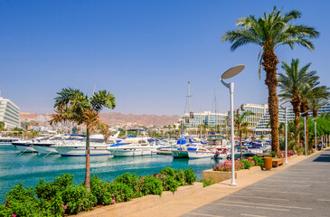 Central marina with pleasure tourist, entertainment, fishing and cruise motorboats and resort and...