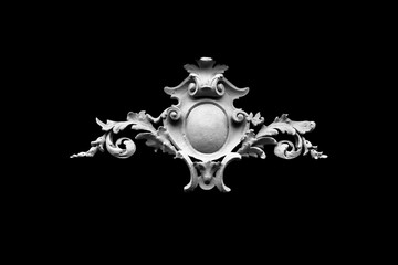 Architectural decoration isolated on black background. Horizontal image. Black and white imge.