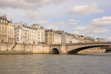 View of Île Saint-Louis and the Pont de la Tournelle in Paris, France