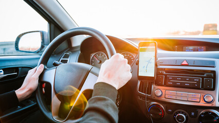 Gps car map system. Global positioning system on smartphone screen in auto car on travel road....