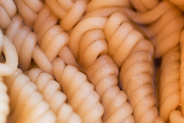 Instant noodles close-up. Spaghetti and pasta with sauce. Healthy food.