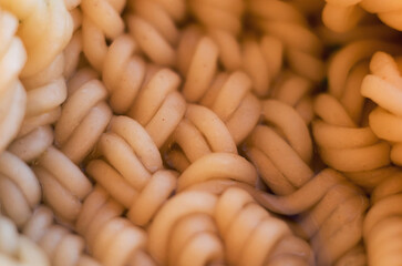 Instant noodles close-up. Spaghetti and pasta with sauce. Healthy food.