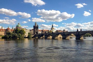 Fototapeta na wymiar St. Charles bridge, Prague, Czech Republic with clouds