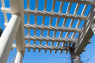 Naklejka premium Close up of white concrete grid structure, abstract architecture detail, part of historic terrace and water reservoir Vidikovac in Rijeka, Croatia