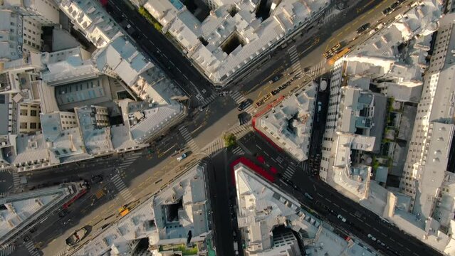 Aerial vertical view of Paris city streets Parisian buildings architecture, and Sacr&eacute;-Coeur Basilica butte Montmartre