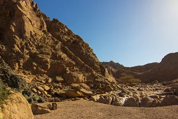 Gordijnen Colored canyon with red sandstone and limestone rocks, Nabq protected area, Sharm El Sheikh, Sinai peninsula, Egypt, North Africa. Egyptian safari © Blumesser