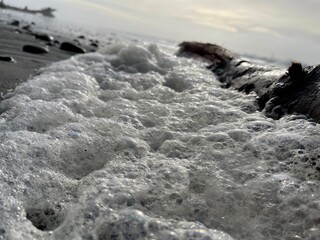 Sea Foam on Beach