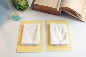 Baby footprint and handprint clay mold To remember in the future how small the baby was in childhood