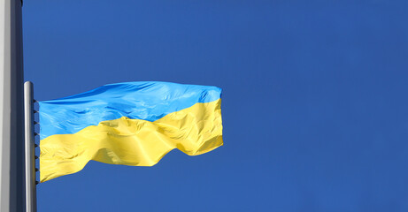 flag of Ukraine on a background of blue sky