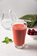 cherry smoothie in glass. cherry berries blended with water. fresh summer smoothie. refreshment...