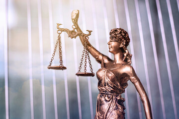 Obraz premium Themis, symbol of law on modern background.