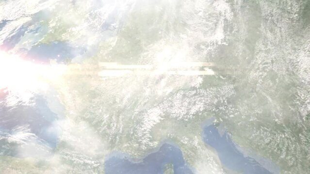 Earth zoom in from outer space to city. Zooming on Freiburg im Breisgau, Germany. The animation continues by zoom out through clouds and atmosphere into space. Images from NASA