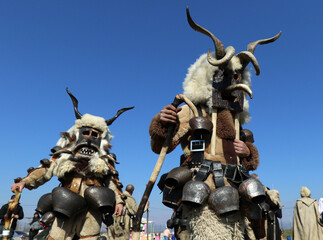 Masquerade festival in Elin Pelin, Bulgaria. People with mask called Kukeri dance and perform to...