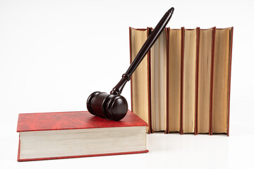 Law concept - law book with a wooden judge's gavel on table. Copy space for text