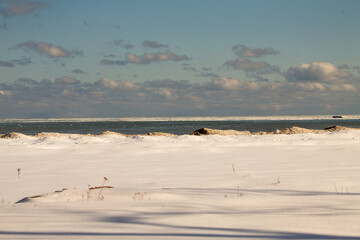 Lake Michigan shoreline and floating ice floes on the lake