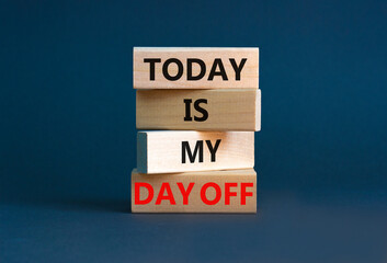 Today is my day off symbol. Concept words Today is my day off on wooden blocks. Beautiful grey table grey background. Today is my day off business concept. Copy space.