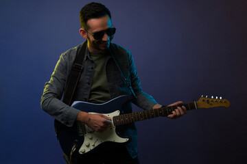 Obraz premium Happy guitarist on a concert