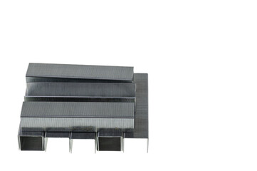 Close up view of metal staples for stapler isolated on white background.