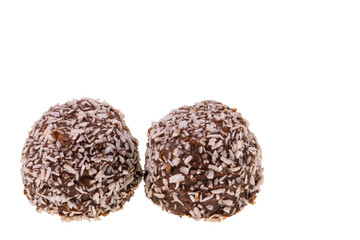 Close up view of chocolate brownies with coconut flakes, isolated on white background.