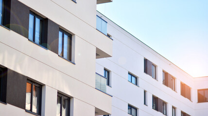 Fragment of modern residential apartment with flat buildings exterior. Detail of new luxury house and home complex.  