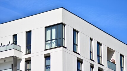 Fragment of modern residential apartment with flat buildings exterior. Detail of new luxury house and home complex.  