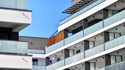 Fragment of modern residential apartment with flat buildings exterior. Detail of new luxury house and home complex.  