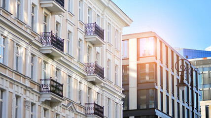 A residential building and an adjacent office building. Modern urban development.