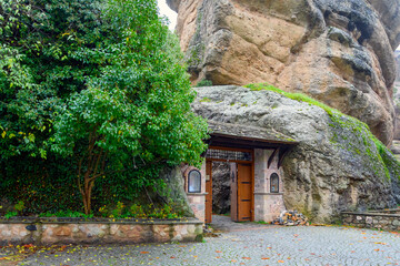 View of the entrance to the Varlaam Monastery covered in mist and fog in the Unesco World Heritage...