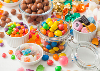 Milk chocolate candies in shell with jelly sugar gums and liquorice allsorts and fruit sherbet...