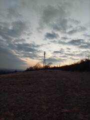 Obraz premium power lines at sunset