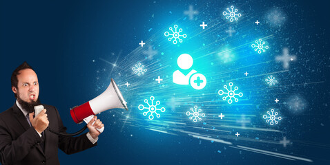 Young person with megaphone and social networking icon