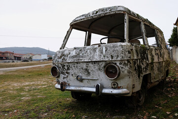 Van abandoned and damaged by the passage of time and inclement weather