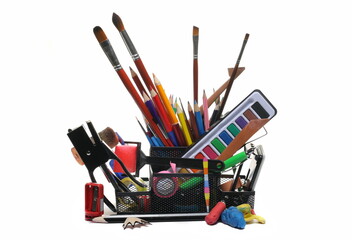 Set supply organizer, black pencil holder filled with office items isolated on white