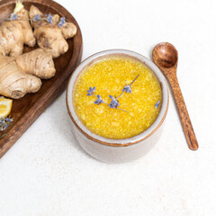 Lemon, ginger in a ceramic bowl