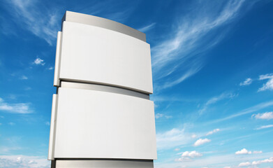 Blank company sign stele mockup  outdoors against cloudy sky 