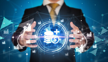 Businessman holdig business icons concept