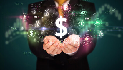 Businessman holding currency symbols concept