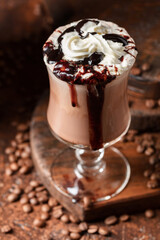 Coffee and chocolate cocktail with whipped cream.