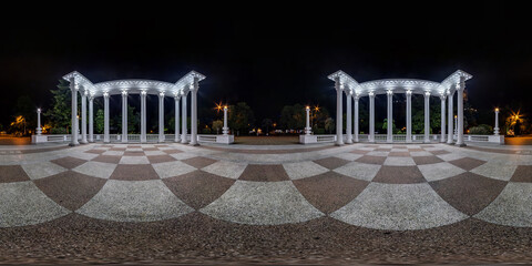 night full seamless spherical 360 hdri panorama in center of city on square with colonnade in...