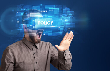 Businessman looking through Virtual Reality glasses