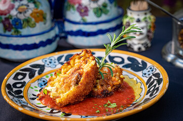 Arancini - fried risotto balls with tomato sauce