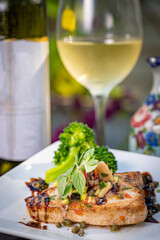 Swordfish with broccoli and capers