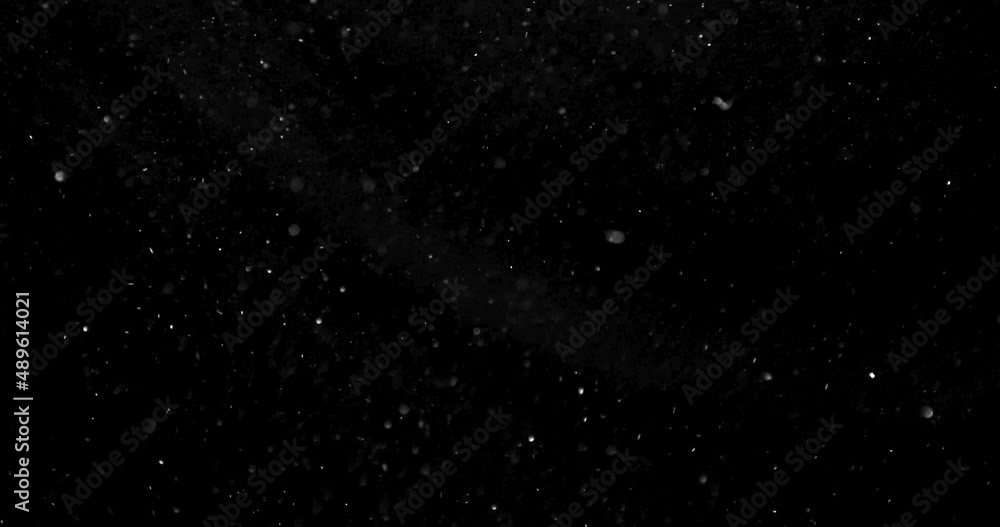 Poster real dust particles floating in the air. organic dust particles macro slow motion recording red came