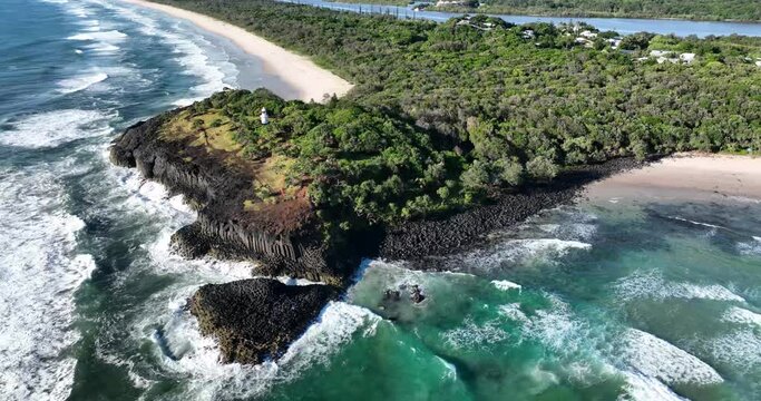 Fingal Headland with the Tweed River behind and Mt Warning on the horizon. Also looking north towards Tweed Heads and the Gold Coast high-rise